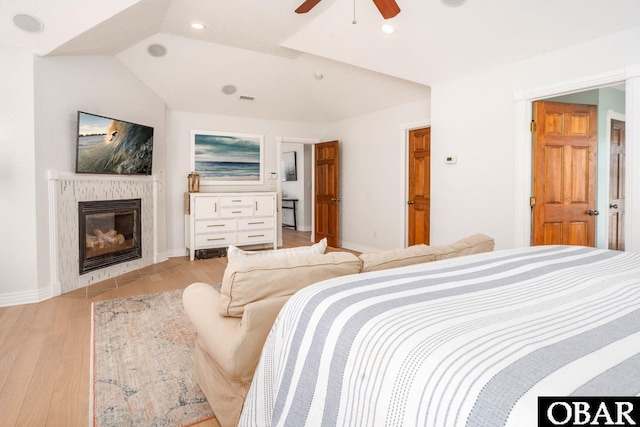 1918 Sandfiddler Rd Lot A, Lot A, Corolla, NC 27927 - bedroom featuring light wood finished floors, recessed lighting, a glass covered fireplace, baseboards, and a ceiling fan
