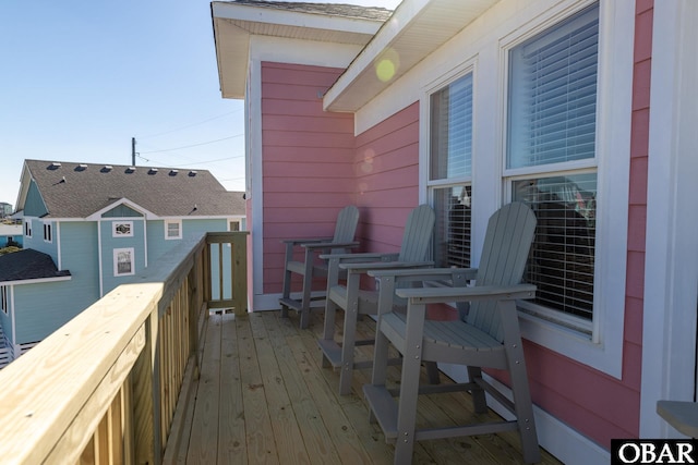 view of wooden balcony with a deck