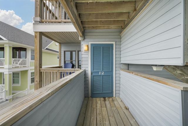 entrance to property featuring a balcony