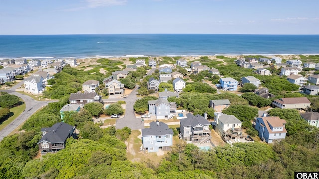 aerial perspective of suburban area with expansive coastline