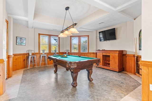 playroom featuring a wainscoted wall, beamed ceiling, and coffered ceiling