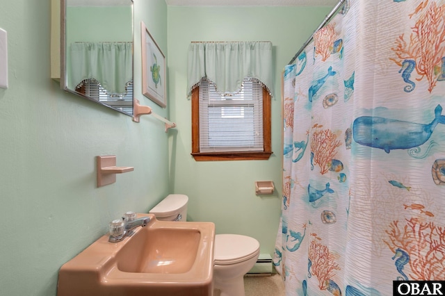 full bath with toilet, a baseboard radiator, a sink, and a shower with shower curtain