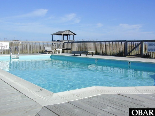 1401 N Virginia Dare Trl Unit # 5C, Kill Devil Hills, NC 27948 - community pool featuring a gazebo