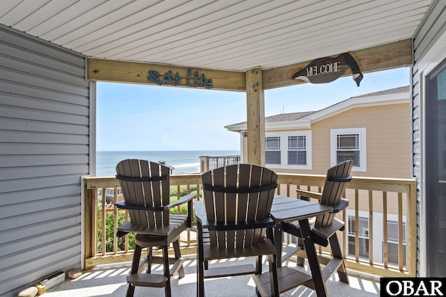 1401 N Virginia Dare Trl Unit # 5C, Kill Devil Hills, NC 27948 - view of patio / terrace with a water view and outdoor dining space