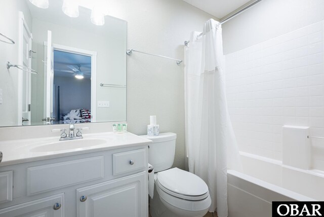 ensuite bathroom with shower / bath combination with curtain, toilet, vanity, and ensuite bath