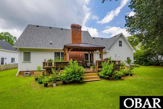 128 Daphne Ln Lot 17, Manteo, NC 27954 - rear view of property with a gazebo, a deck, a chimney, a lawn, and a shingled roof