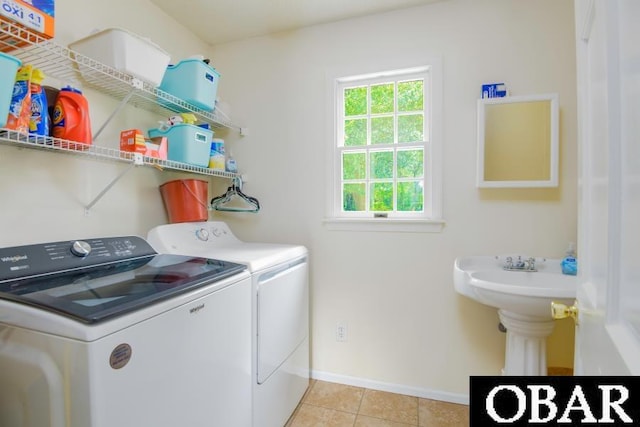 128 Daphne Ln Lot 17, Manteo, NC 27954 - laundry area with washer and dryer and light tile patterned floors