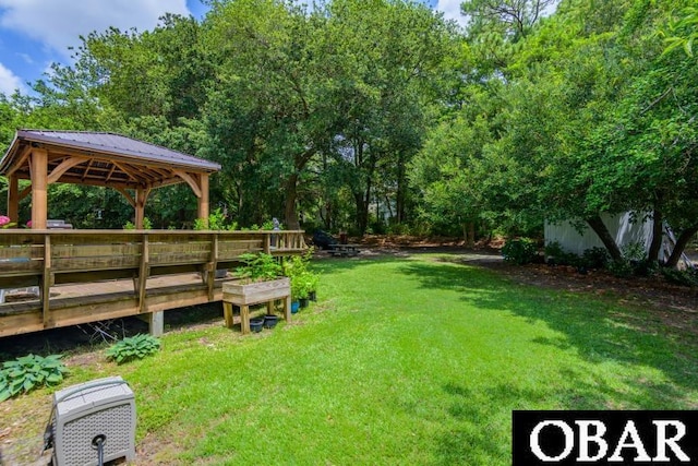 128 Daphne Ln Lot 17, Manteo, NC 27954 - view of green lawn featuring a gazebo and view of wooded area