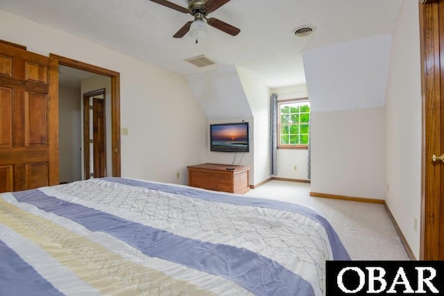 128 Daphne Ln Lot 17, Manteo, NC 27954 - bedroom featuring light carpet, vaulted ceiling, and ceiling fan