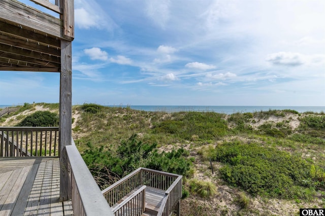 deck featuring a water view