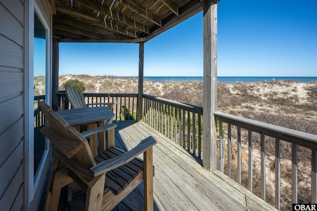 deck featuring a water view