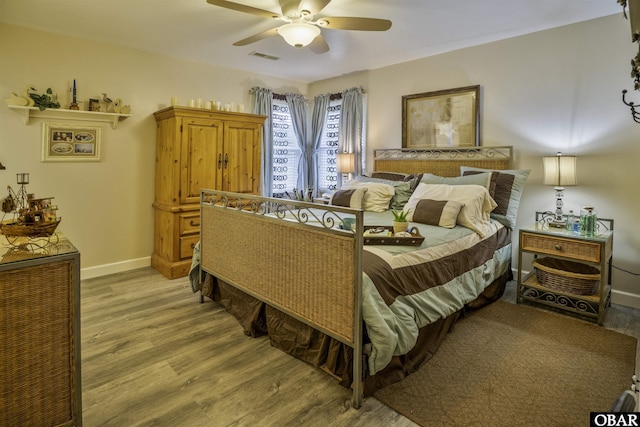 400 Driftwood Dr Lot 168, Elizabeth City, NC 27909 - bedroom featuring light wood-style flooring, baseboards, and ceiling fan