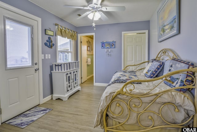 400 Driftwood Dr Lot 168, Elizabeth City, NC 27909 - bedroom featuring baseboards, light wood-style flooring, and ceiling fan