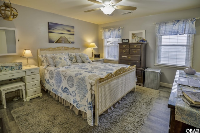 400 Driftwood Dr Lot 168, Elizabeth City, NC 27909 - bedroom with wood finished floors, a ceiling fan, and baseboards
