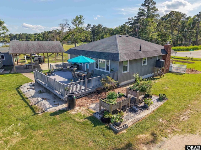 400 Driftwood Dr Lot 168, Elizabeth City, NC 27909 - back of property featuring roof with shingles, a lawn, a gazebo, and a chimney