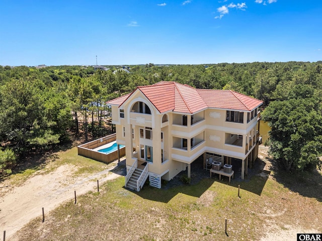 2250 Ocean Pearl Rd Lot 13, Corolla, NC 27927 - view of subject property with a forest and a pool area