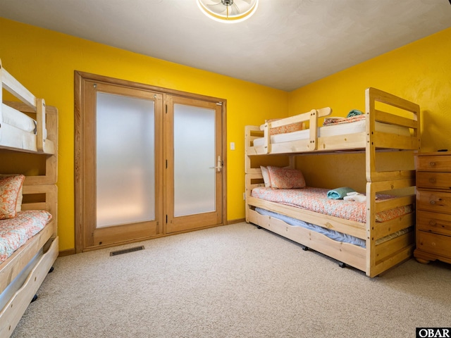 2250 Ocean Pearl Rd Lot 13, Corolla, NC 27927 - bedroom with carpet floors and access to outside