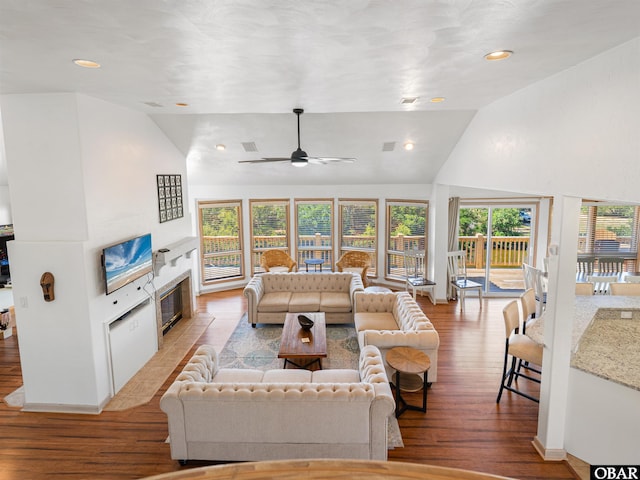 2250 Ocean Pearl Rd Lot 13, Corolla, NC 27927 - living room featuring lofted ceiling, a fireplace with flush hearth, light wood finished floors, a ceiling fan, and recessed lighting