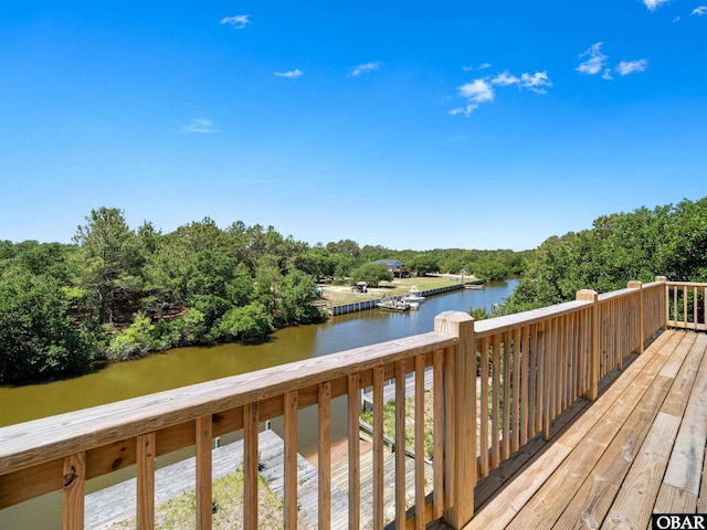 2250 Ocean Pearl Rd Lot 13, Corolla, NC 27927 - deck with a water view and view of wooded area