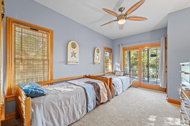 bedroom with light carpet, access to outside, a ceiling fan, and baseboards