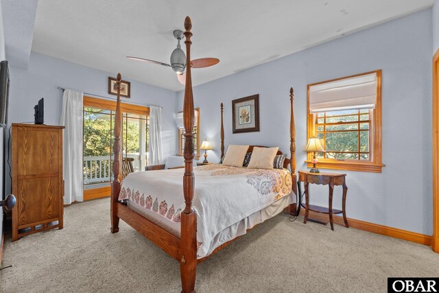 bedroom featuring ceiling fan, carpet, baseboards, and access to outside