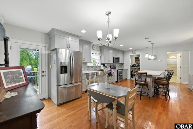 102 Lighthouse Vw Lot 5, Aydlett, NC 27916 - dining area featuring a chandelier, light wood-style flooring, and recessed lighting