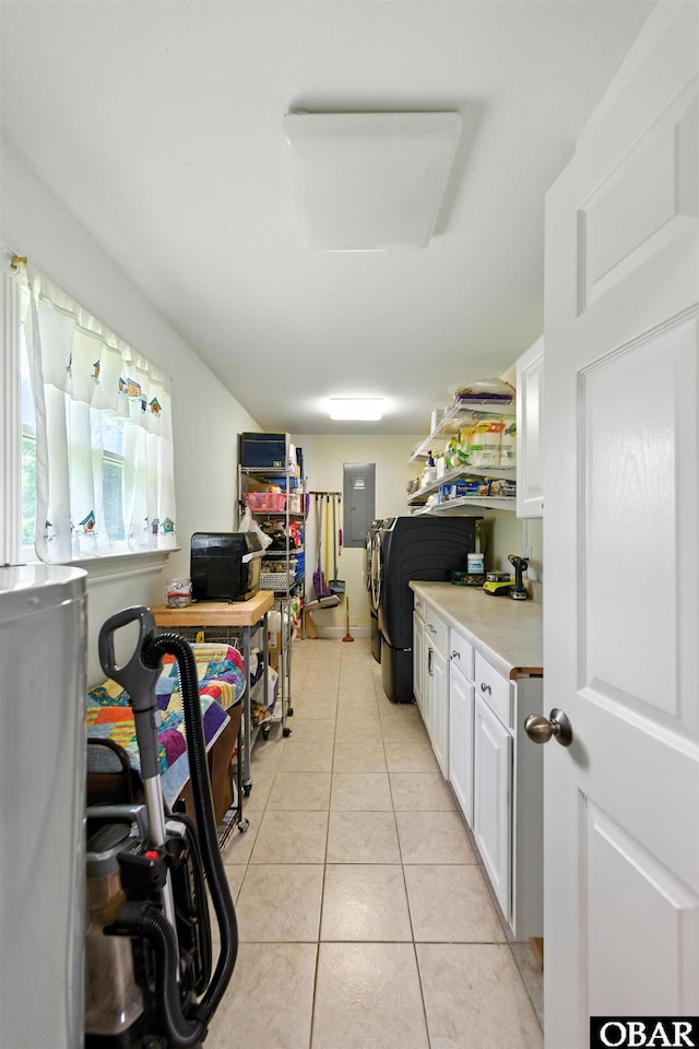 102 Lighthouse Vw Lot 5, Aydlett, NC 27916 - kitchen with electric panel, white cabinetry, light countertops, and light tile patterned flooring