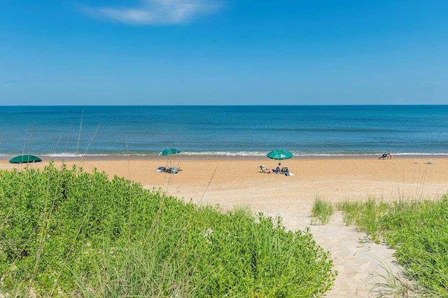 view of water feature with a beach view