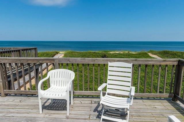 deck featuring a water view