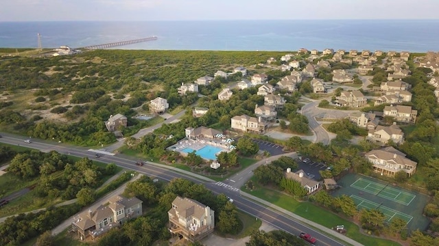 birds eye view of property featuring a water view and a residential view