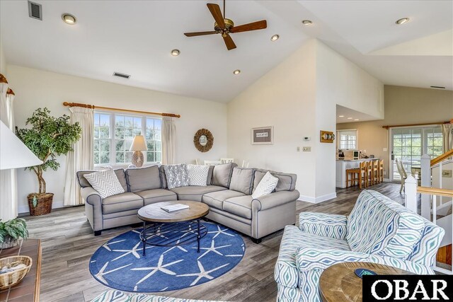 living room with visible vents and wood finished floors