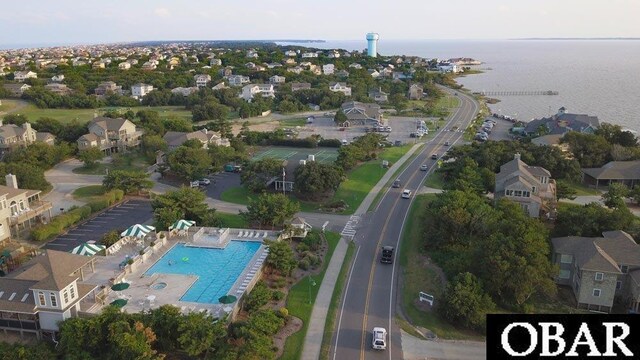 aerial view featuring a water view and a residential view