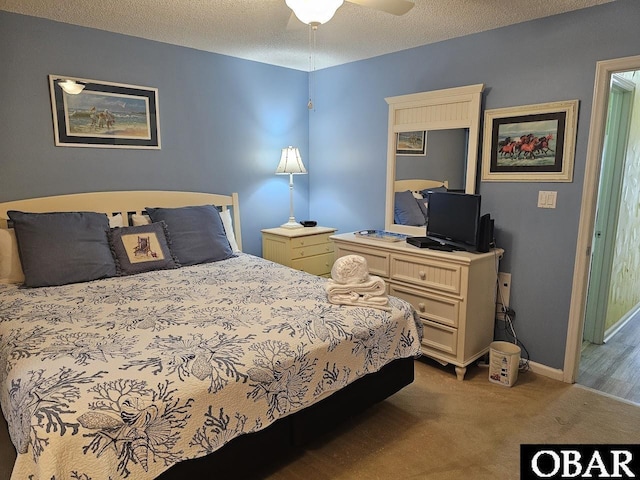 2035 S Virginia Dare Trl Unit 11, Kill Devil Hills, NC 27948 - carpeted bedroom with baseboards and a ceiling fan