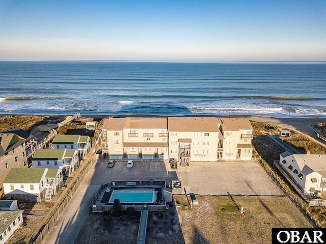 2035 S Virginia Dare Trl Unit 11, Kill Devil Hills, NC 27948 - drone / aerial view of a pool area and a large body of water