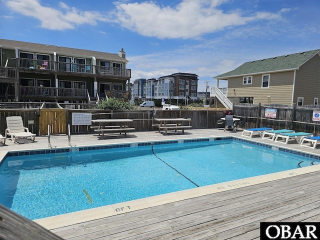 2035 S Virginia Dare Trl Unit 11, Kill Devil Hills, NC 27948 - community pool featuring fence and a deck