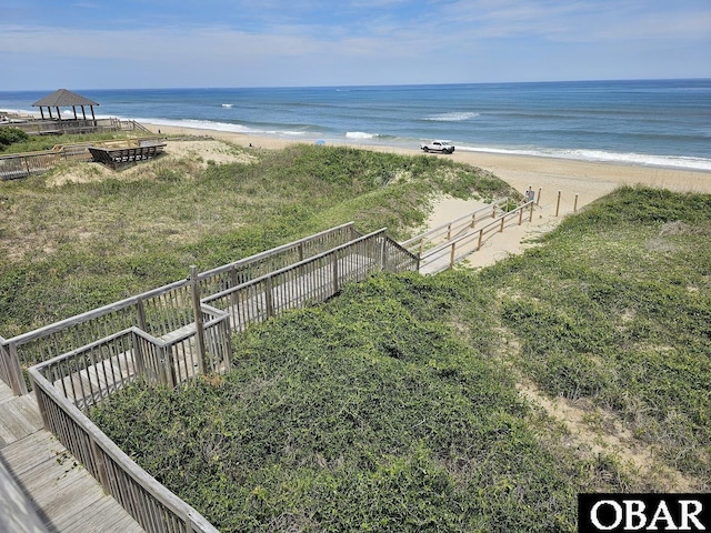 2035 S Virginia Dare Trl Unit 11, Kill Devil Hills, NC 27948 - water view featuring nearby beach and fence