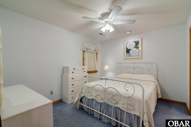 bedroom featuring visible vents, baseboards, carpet, and a textured ceiling