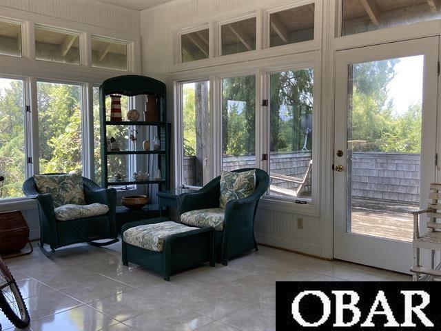 106 Middle Rd Lot 11, 12, Ocracoke, NC 27960 - sunroom with plenty of natural light and tile patterned flooring