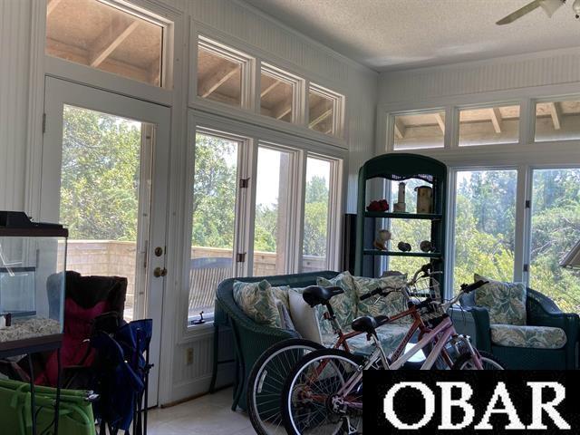 106 Middle Rd Lot 11, 12, Ocracoke, NC 27960 - sunroom featuring french doors and ceiling fan
