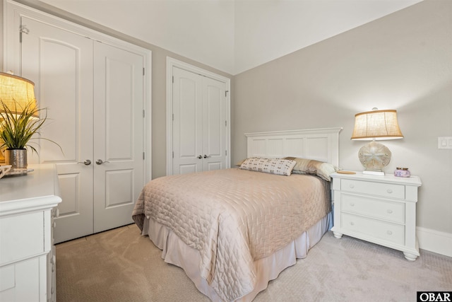 2001 Creek Rd Lot 16, Kitty Hawk, NC 27949 - bedroom with light carpet and multiple closets