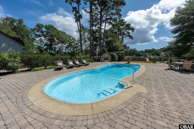 2001 Creek Rd Lot 16, Kitty Hawk, NC 27949 - view of swimming pool with a patio area and a storage unit
