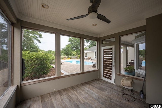 2001 Creek Rd Lot 16, Kitty Hawk, NC 27949 - unfurnished sunroom featuring plenty of natural light, wood finished floors, and ornamental molding