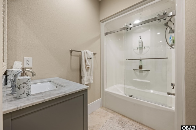2001 Creek Rd Lot 16, Kitty Hawk, NC 27949 - bathroom featuring combined bath / shower with glass door, tile patterned flooring, vanity, and a textured wall