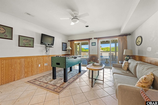 369 Deep Neck Rd Lot # 139, Corolla, NC 27927 - rec room featuring a wainscoted wall, light tile patterned floors, wooden walls, and a ceiling fan