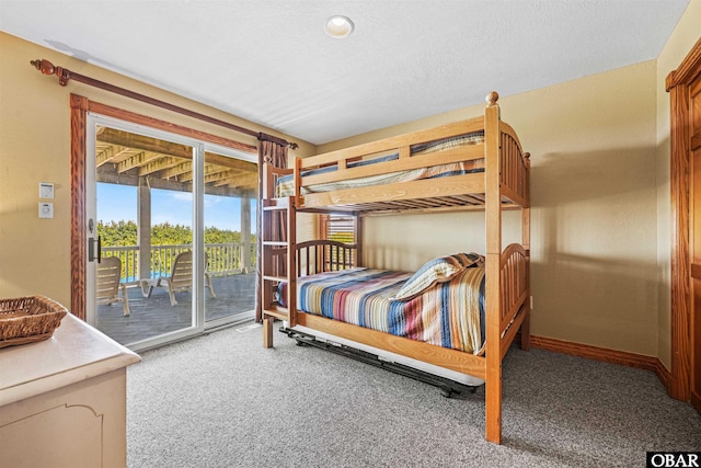 369 Deep Neck Rd Lot # 139, Corolla, NC 27927 - bedroom with carpet floors and access to exterior