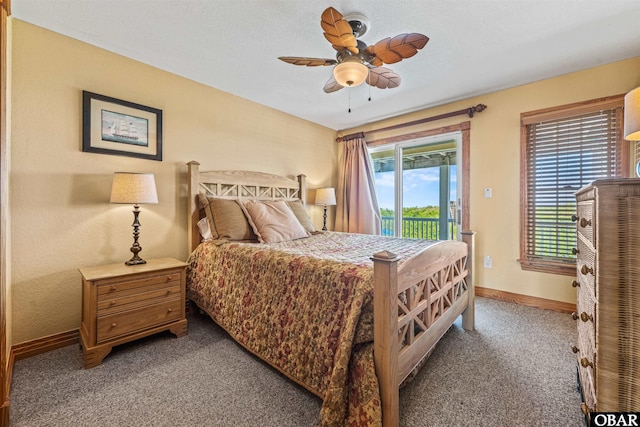 369 Deep Neck Rd Lot # 139, Corolla, NC 27927 - carpeted bedroom featuring access to outside and ceiling fan