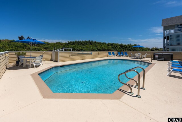 369 Deep Neck Rd Lot # 139, Corolla, NC 27927 - view of swimming pool featuring a patio and outdoor dining area