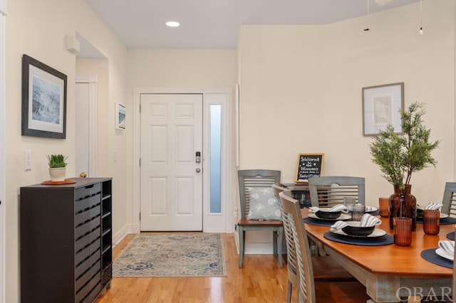 foyer entrance featuring light wood-style floors and recessed lighting