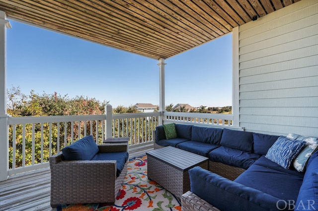 deck featuring an outdoor living space