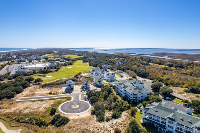 bird's eye view with view of golf course and a water view